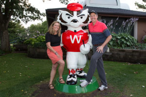 Sarah and Paul Harari with Bucky the Golfer