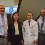 Howard Bailey, director of UW Carbone Cancer Research Center with Kristine Donahue, biology graduate student, Jacob Witt, UW radiation oncology resident and SMPH Dean Robert Golden