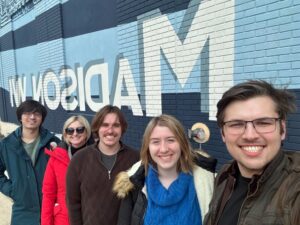 Group photo in front of Madison mural