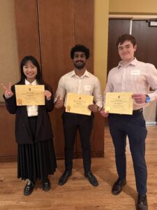 Photo of three undergraduates holding their awards.